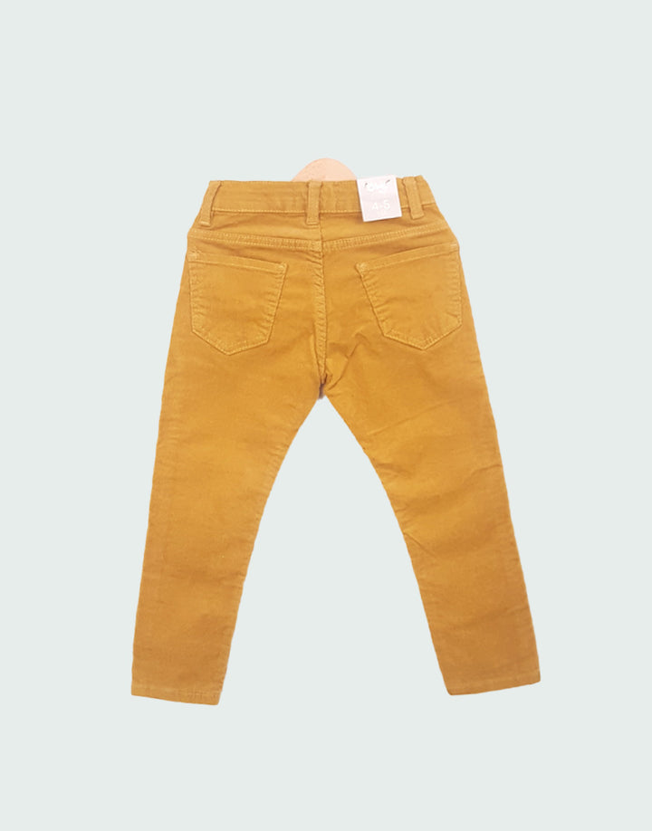 Mustard cord trousers, back