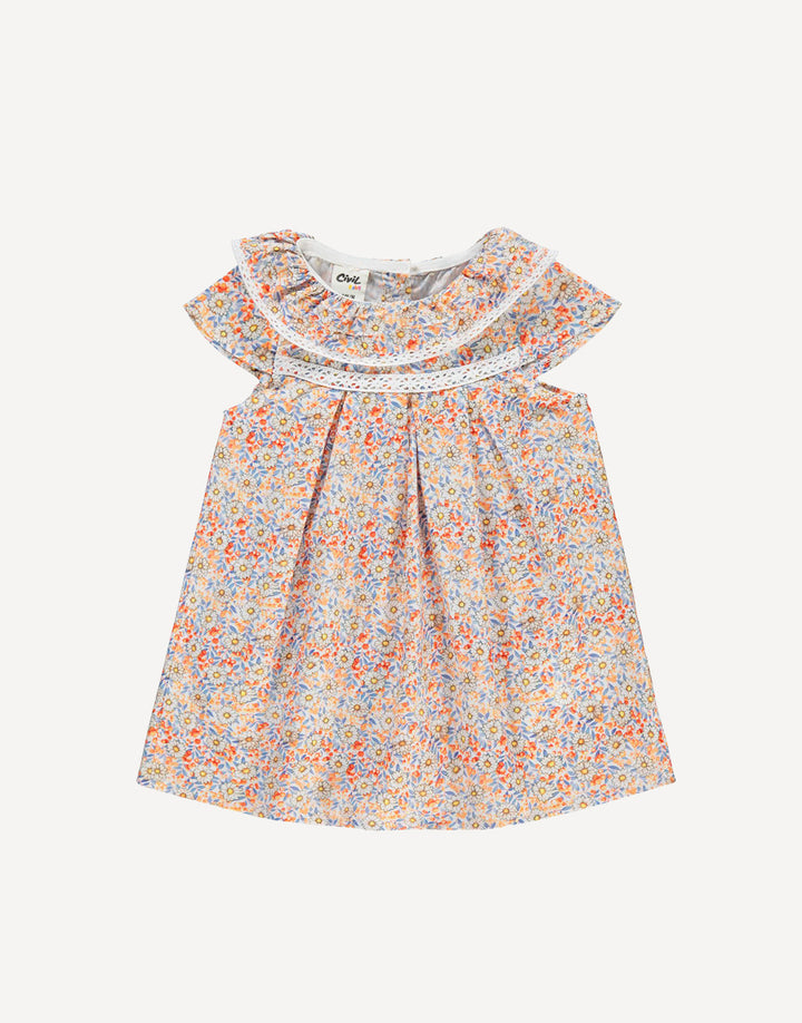 Designed with practicality and elegance in mind, the back button fastenings ensure effortless dressing, allowing you to spend less time fussing and more time enjoying the sunshine. The playful frilled short sleeves add a touch of whimsy and charm, perfect for embracing the carefree spirit of summer.